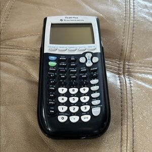 Texas Instruments TI-84 Plus Graphing Calculator - Black and White
